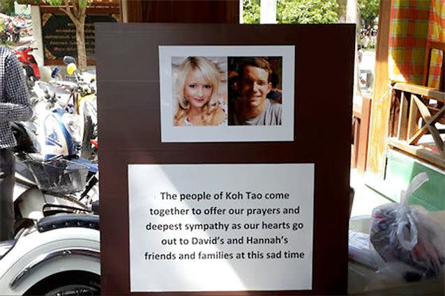 Pictures of killed British tourists David Miller, 24, and Hannah Witheridge, 23 are displayed alongside a message of support to their friends and families during a special prayer service on Koh Tao island.