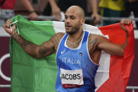 Lamont Marcell Jacobs, of Italy, celebrates after winning the final of the men's 100-meters at the 2020 Summer Olympics, Sunday, Aug. 1, 2021, in Tokyo. (AP Photo/Matthias Schrader)