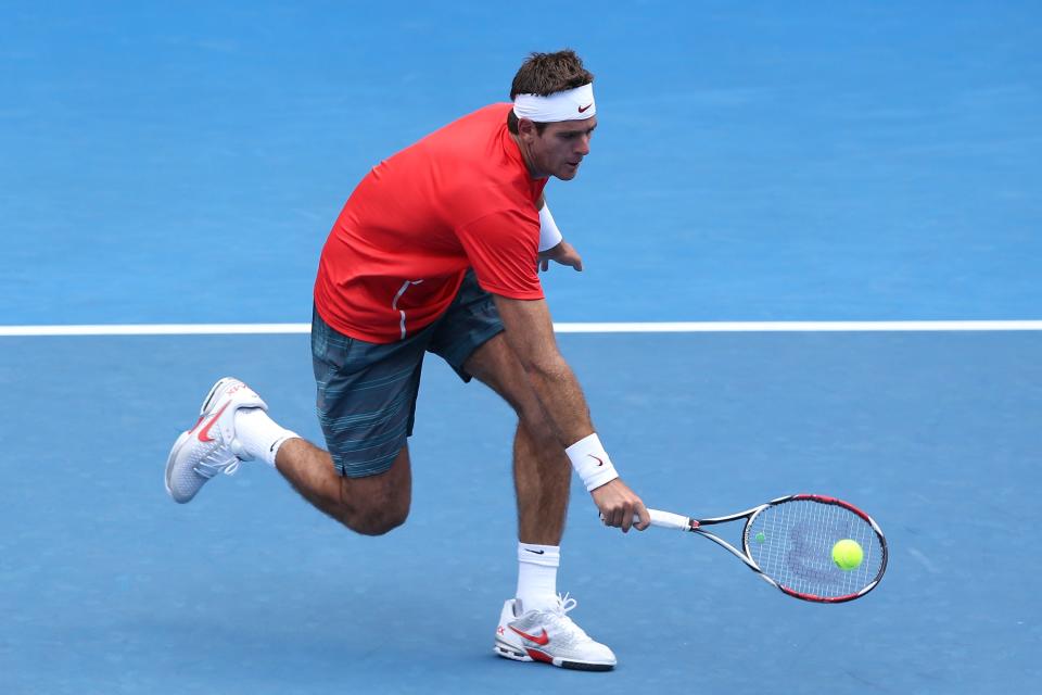MELBOURNE, AUSTRALIA - JANUARY 14: Juan Martn Del Potro of Argentina plays a backhand in his first round match against Rhyne Williams of the United States during day two of the 2014 Australian Open at Melbourne Park on January 14, 2014 in Melbourne, Australia. (Photo by Michael Dodge/Getty Images)