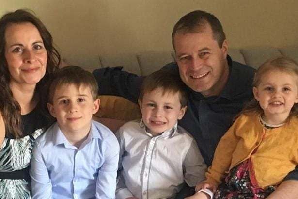 Deirdre Morley, 43, and Andrew McGinley with their three children, nine-year-old Conor (second left), seven-year-old Darragh (centre) and three-year-old Carla (far right) (PA)