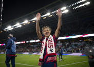 United States' forward Carli Lloyd waves to fans after a soccer friendly match against South Korea, Tuesday, Oct. 26, 2021, in St. Paul, Minn. (Jeff Wheeler/Star Tribune via AP)