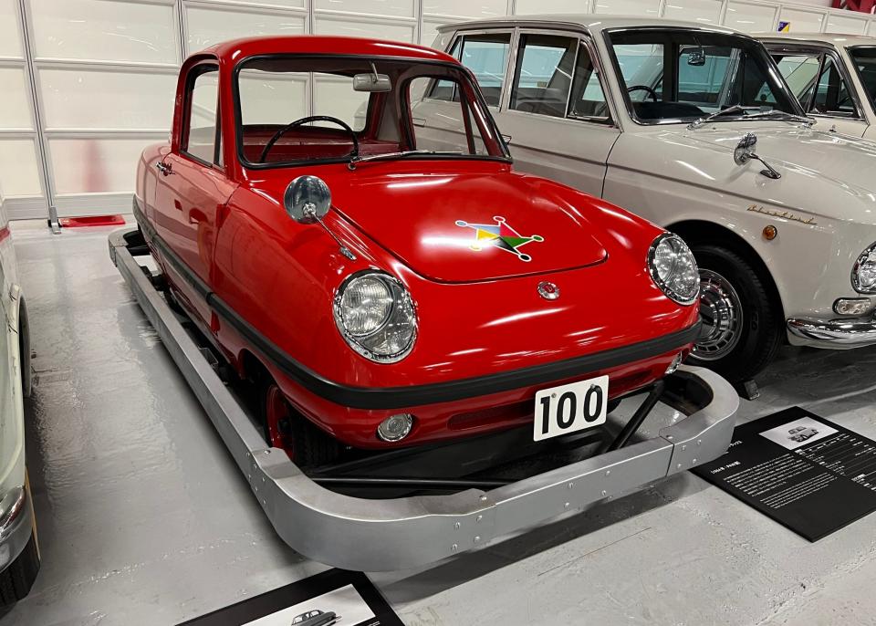 A "bumper car" designed to be driven by children at an amusement park.