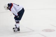 USA forward Phil Kessel looks down on the ice after Team USA's 1-0 loss to Canada in the men's semifinal ice hockey game at the 2014 Winter Olympics, Friday, Feb. 21, 2014, in Sochi, Russia. (AP Photo/Mark Humphrey)