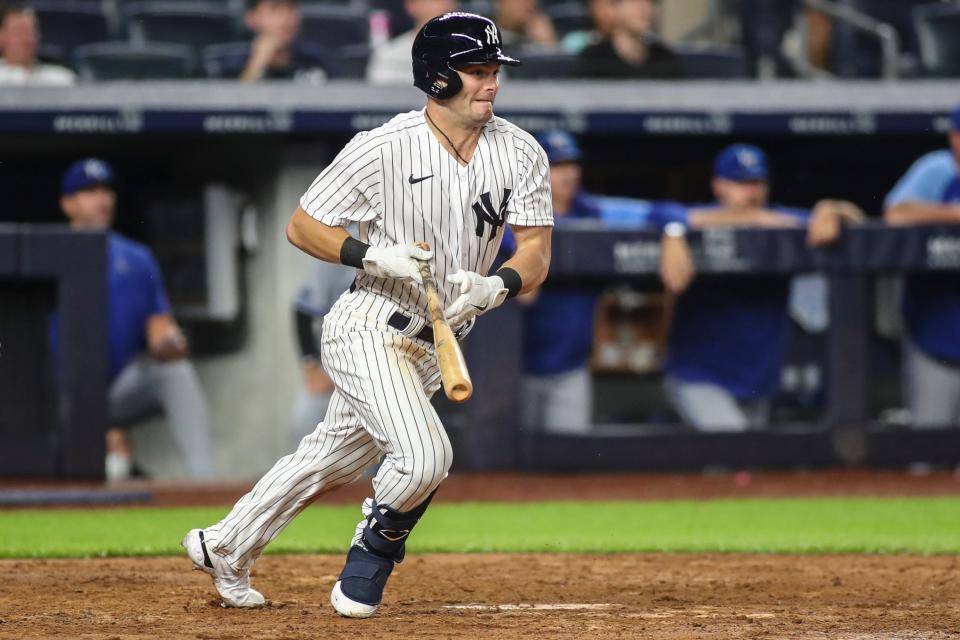 Yankees outfielder Andrew Benintendi follows through on an infield single against the Royals at Yankee Stadium in New York on July 29, 2022.