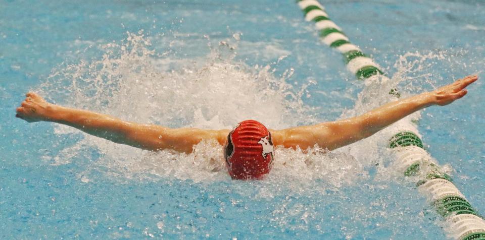 Roosevelt's Kadin Pyka swims the butterfly leg of the 200 medley in the Northeast District meet at Robert F. Busbey Natatorium at Cleveland State University on Friday, Feb. 16, 2024.