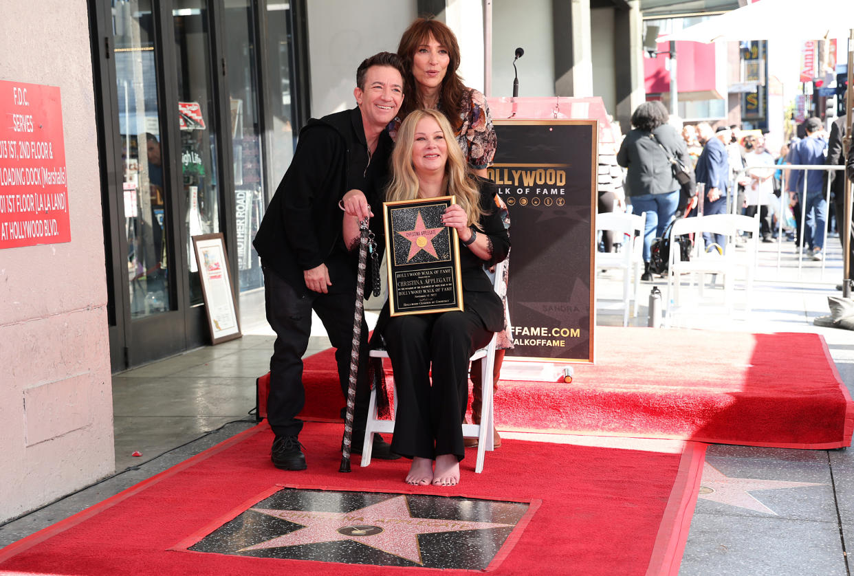 David Faustino, Katey Sagal, and Christina Applegate pose with Christina Applegate's star during her Hollywood Walk of Fame Ceremony. (Phillip Faraone / Getty Images)
