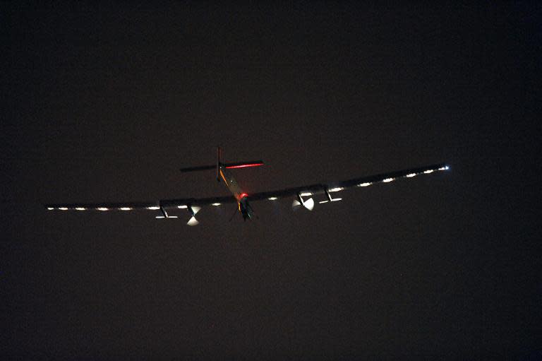 Solar Impulse 2 comes in to land in Chongqing airport at 1:35 am (17:35 GMT Monday) after a 20-and-a-half hour flight from Myanmar, on March 31, 2015