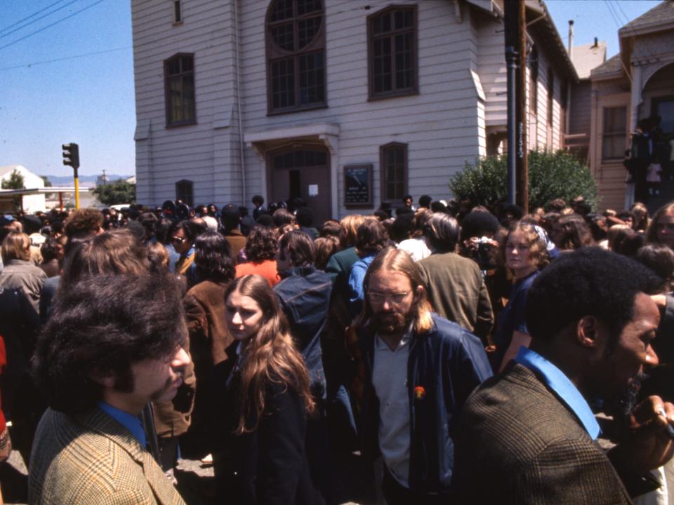 Panthers bid farewell as a casket containing the body of Jonathan Jackson is brought into St. Augustin's Episcopal Church for funeral services.