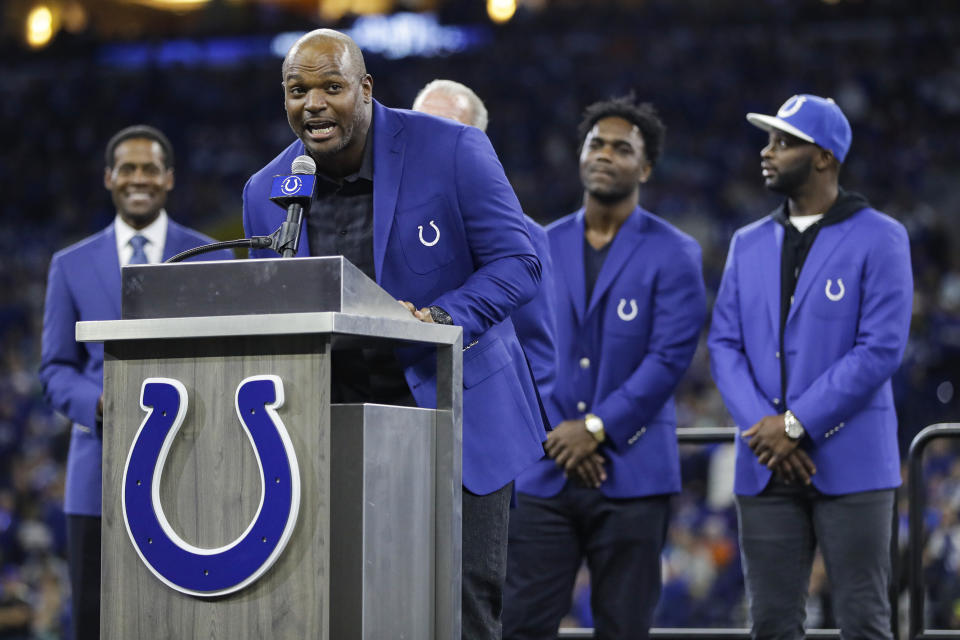 Former Indianapolis Colts defensive end Dwight Freeney speaks during his Ring of Honor induction ceremony during half time of an NFL football game against the Miami Dolphins in Indianapolis, Sunday, Nov. 10, 2019. (AP Photo/Darron Cummings)