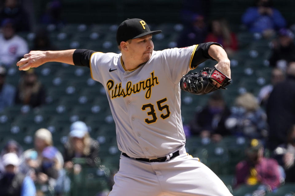 Pittsburgh Pirates starting pitcher Trevor Cahill delivers during the first inning of a baseball game against the Chicago Cubs Friday, May 7, 2021, in Chicago. (AP Photo/Charles Rex Arbogast)