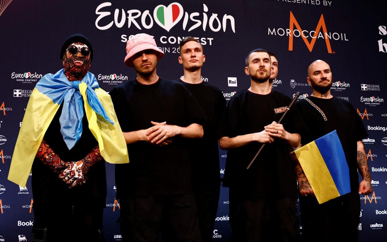 Kalush Orchestra from Ukraine pose for photographers after winning the 2022 Eurovision - REUTERS/Yara Nardi