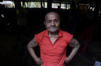 Indian body builder Manohar Aich attends a gymnasium on the eve of his 100th birthday, in Kolkata on March 16, 2012.