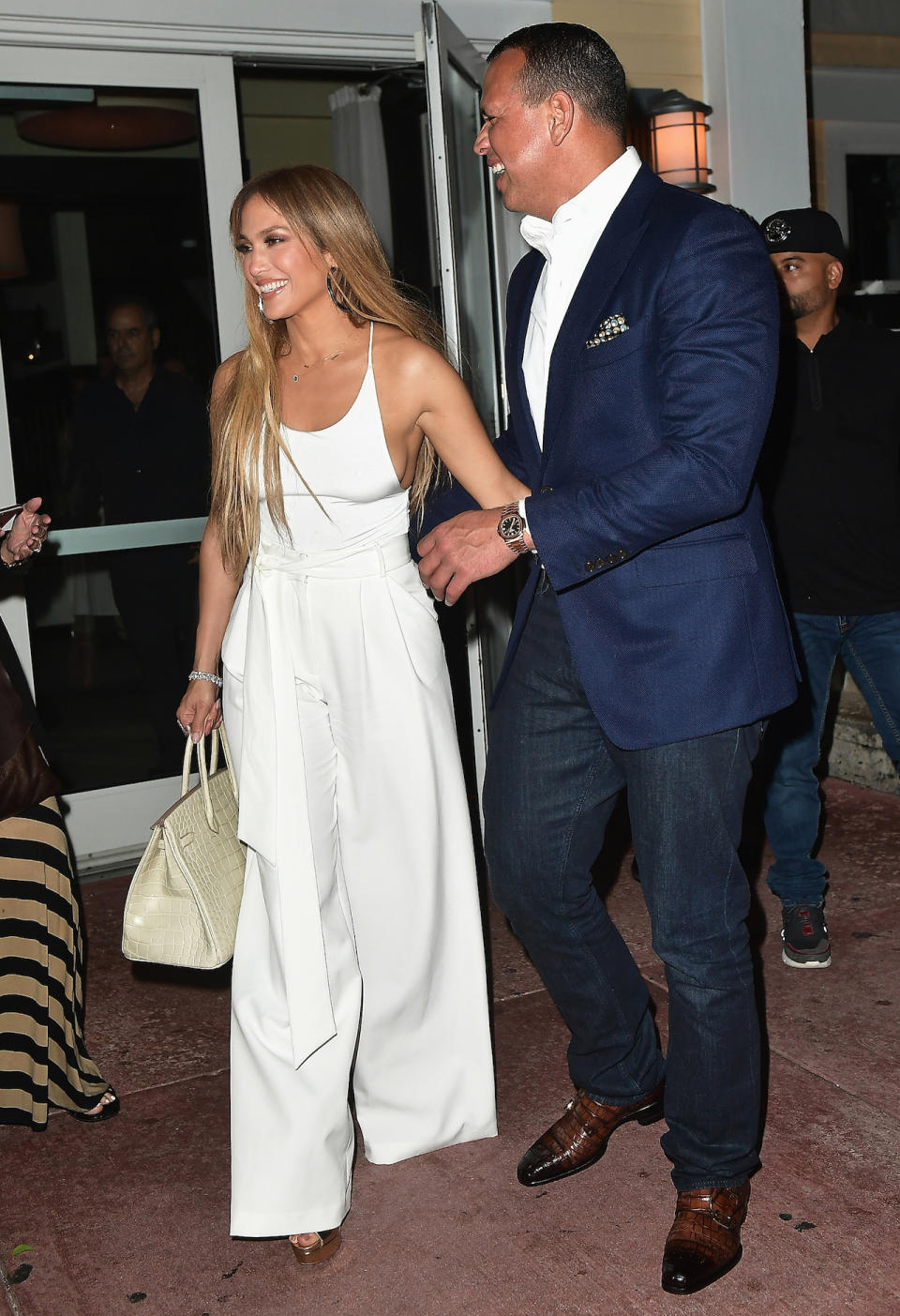 In A Naked Wardrobe Bodysuit And Milly Trousers With An Hermès Handbag And Jennifer Fisher Earrings