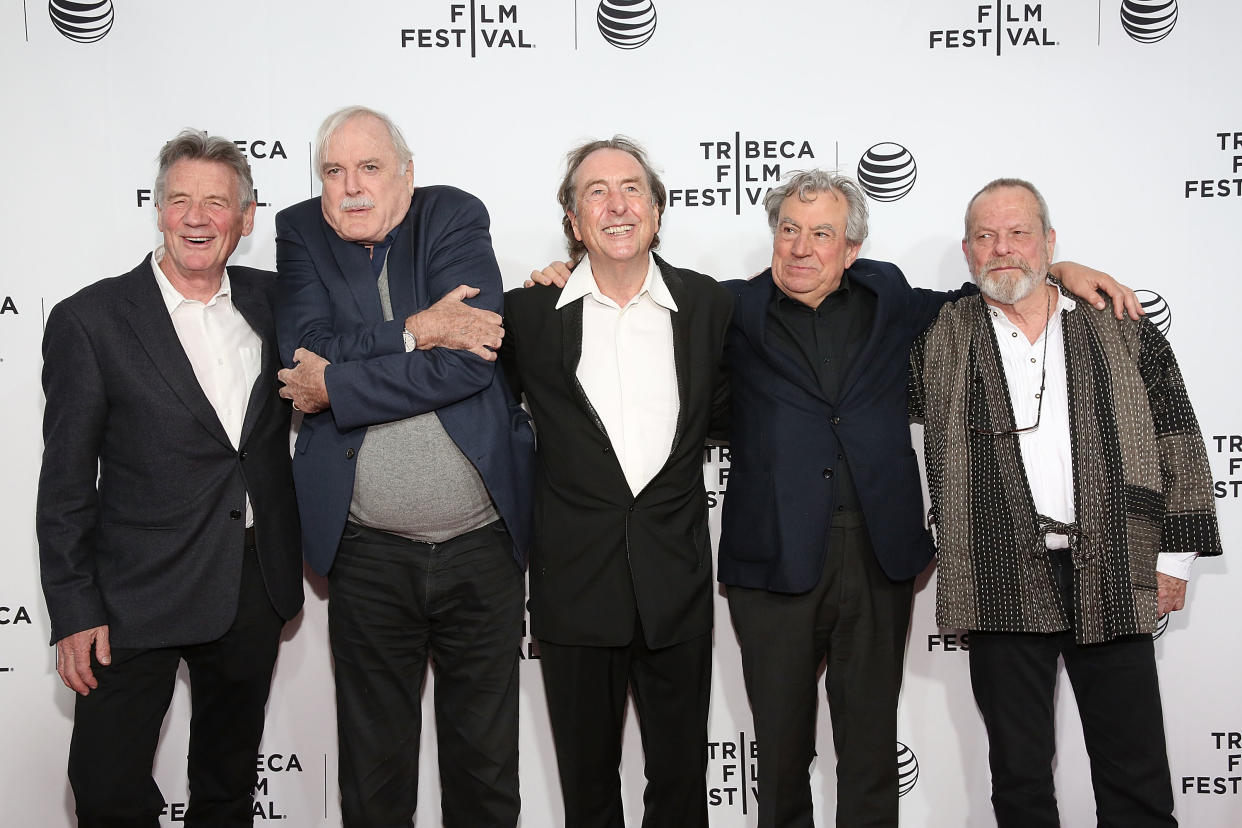 Eric Idle (center, pictured in 2015 with fellow Monty Python stars Michael Palin, John Cleese, the late Terry Jones and Terry Gilliam) hit out at a Twitter post from the comedy group's official account which encouraged fans to go out to bars and restaurants during the pandemic. (Photo: Mireya Acierto/FilmMagic)