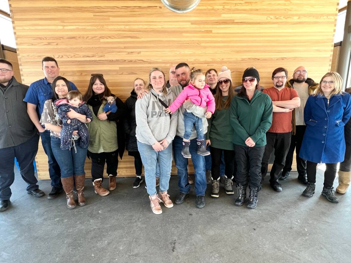 About a dozen people, most of them strangers, showed up for Vanessa Yawney and Derek Loewen's wedding at St. Vital Park. (Travis Golby/CBC - image credit)