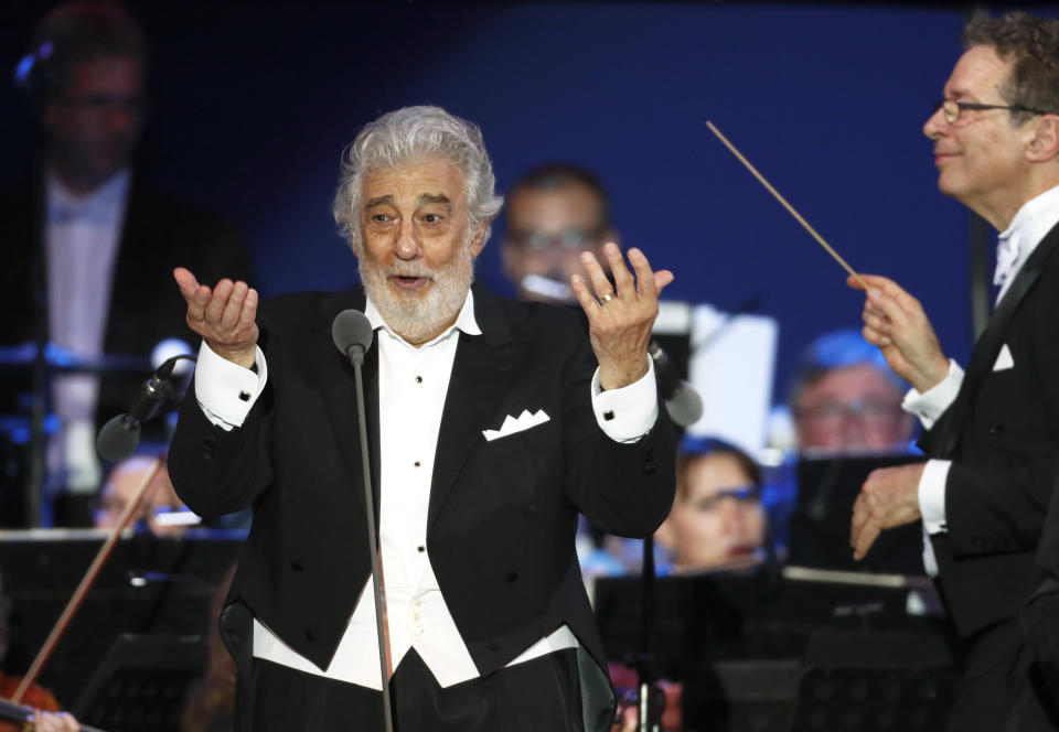 FILE - In this file photo taken on Aug. 28, 2019, Opera star Placido Domingo performs during a concert in Szeged, Hungary. The 78-year-old singer who rose to stardom as a tenor has been confirmed to sing the baritone title role in “Nabucco” at the Zurich Opera House this Sunday. It will be his first time performing since stepping down Oct. 2 as general director of the Los Angeles Opera and withdrawing from future performances at the company. (AP Photo/Laszlo Balogh)