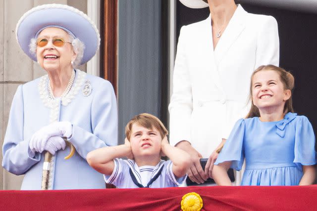 <p>Samir Hussein/WireImage</p> Queen Elizabeth, Prince Louis and Princess Charlotte at 2022 Trooping the Colour