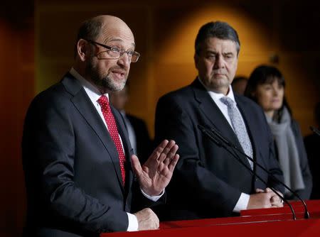 Martin Schulz, former president of the European Parliament speaks next to German Economy Minister and Leader of the Social Democratic Party (SPD) Sigmar Gabriel during a news conference in Berlin, Germany, January 24, 2017. REUTERS/Fabrizio Bensch