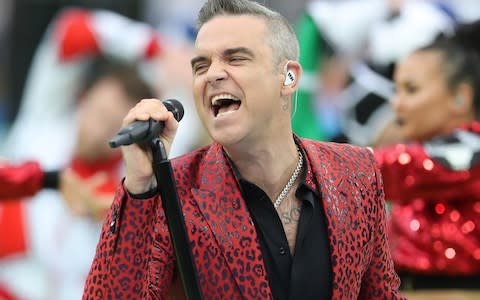 Last year Robbie Williams boasted that he "smoked a spliff in Buckingham Palace" when he headlined the Queen's Diamond Jubilee concert in 2012 - Credit: Ian MacNicol/Getty Images Europe