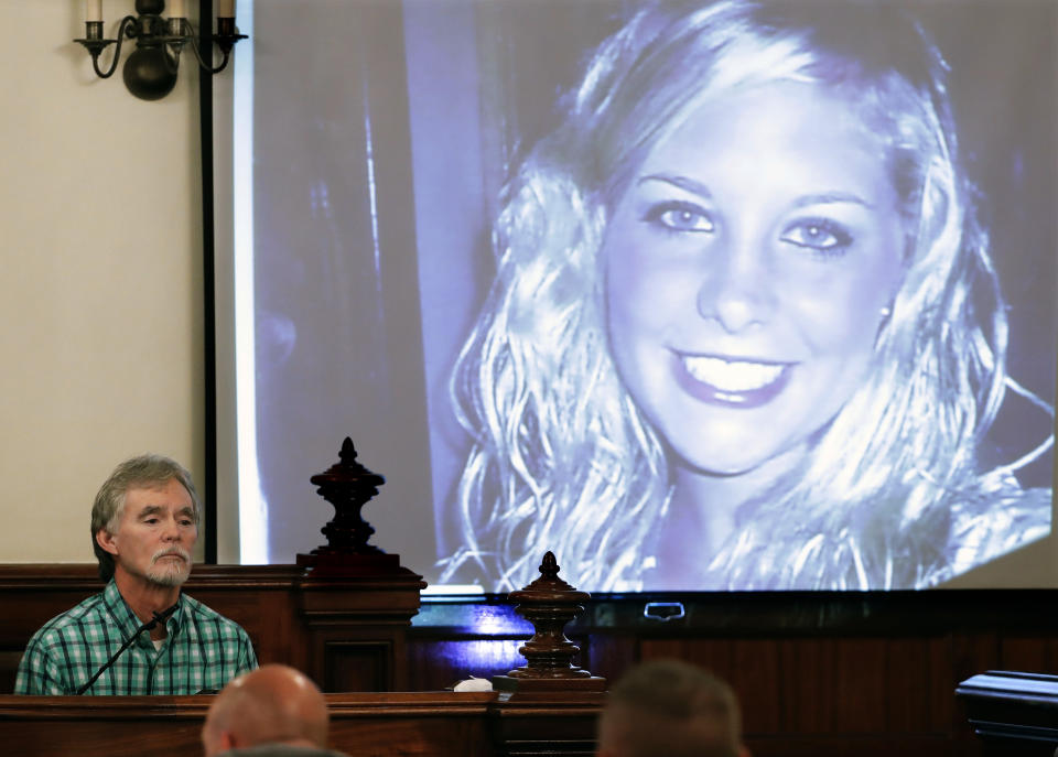 FILE - Dana Bobo, left, father of Holly Bobo, testifies in the trial of Zachary Adams as a photo of Holly Bobo is displayed on Sept. 11, 2017, in Savannah, Tenn. Jason Autry, a convicted felon who was released from prison after giving key trial testimony about the slaying of Tennessee nursing student Holly Bobo, plans to change his plea to guilty on weapons charges filed shortly after he was granted his freedom, according to an Oct. 3, 2022, court filing obtained by The Associated Press. (AP Photo/Mark Humphrey, Pool, File)