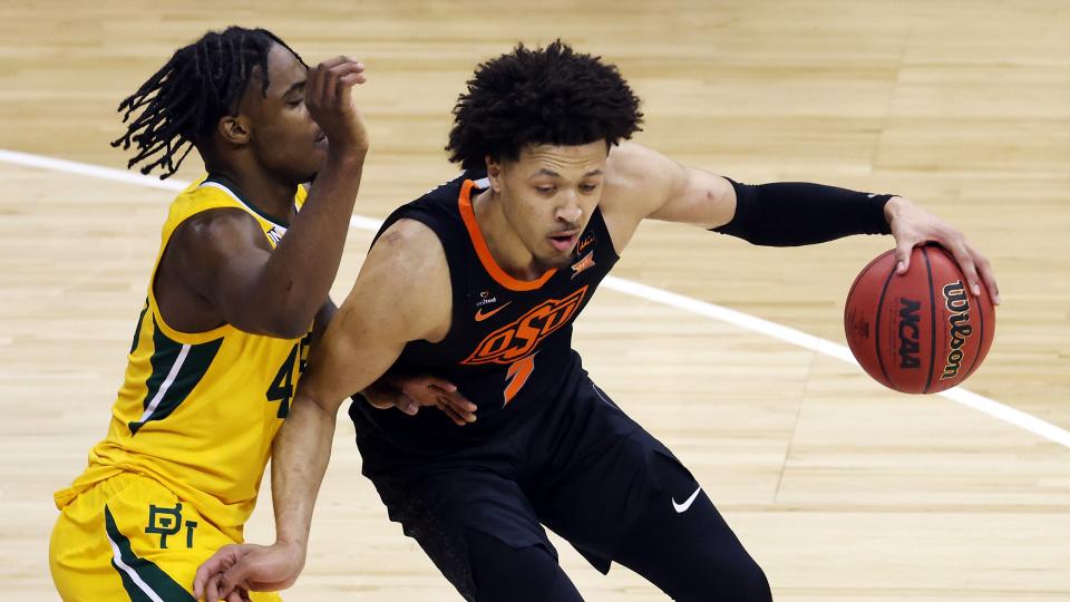 Cade Cunningham of the Oklahoma State Cowboys (right) is the clear-cut choice as the No. 1 draft pick by the Pistons.