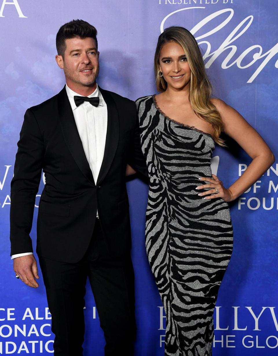 Robin Thicke (L) and April Love Geary arrive at The Global Ocean Gala Honoring HSH Prince Albert II Of Monaco..