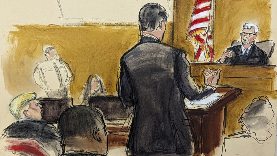 Defense attorney Todd Blanche, at podium, makes arguments challenging the contempt charges to Judge Juan Merchan , Tuesday, April 23, 2024, in New York. (Elizabeth Williams via AP)