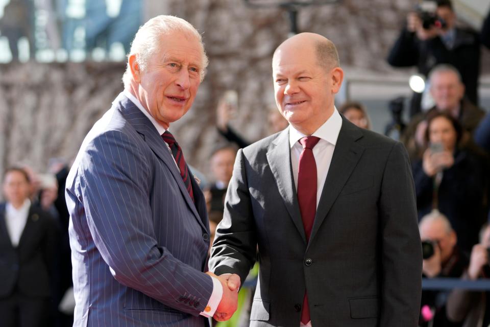 German Chancellor Olaf Scholz welcomes Britain's King Charles III at the chancellery in Berlin, Thursday, March 30, 2023.