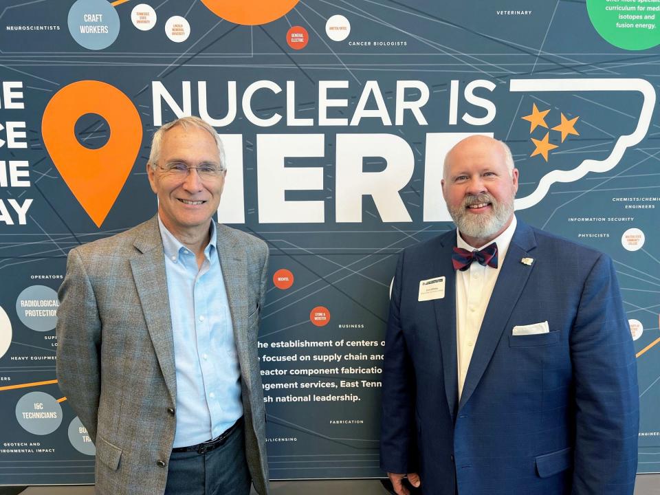 Jeff Smith, from left, interim president and CEO of UT-Battelle and interim ORNL director, presented a $100,000 check to Roane State Community College President Chris Whaley for the launch of a nuclear technology program at the college.
