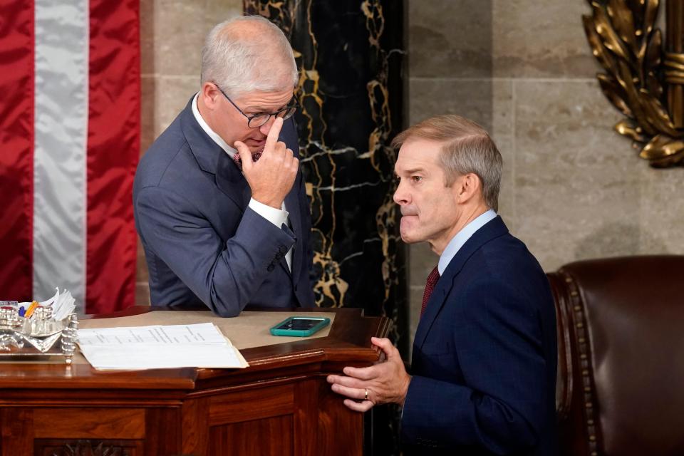 Temporary House leader Rep. Patrick McHenry, R-N.C., talks with Rep. Jim Jordan, R-Ohio, as Republicans try to elect Jordan in a second ballot to be the new House speaker, at the Capitol in Washington, Wednesday, Oct. 18, 2023.