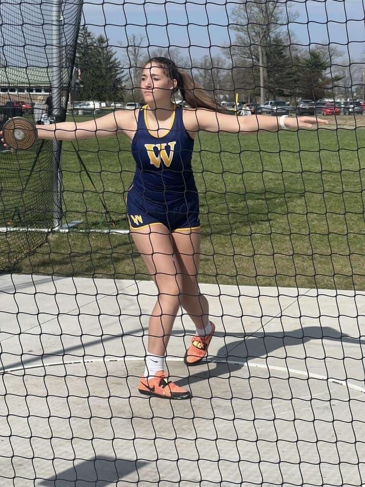 Kenzie Gray throws the discus for Whiteford Saturday in the Bobcat Legacy Relays Saturday.