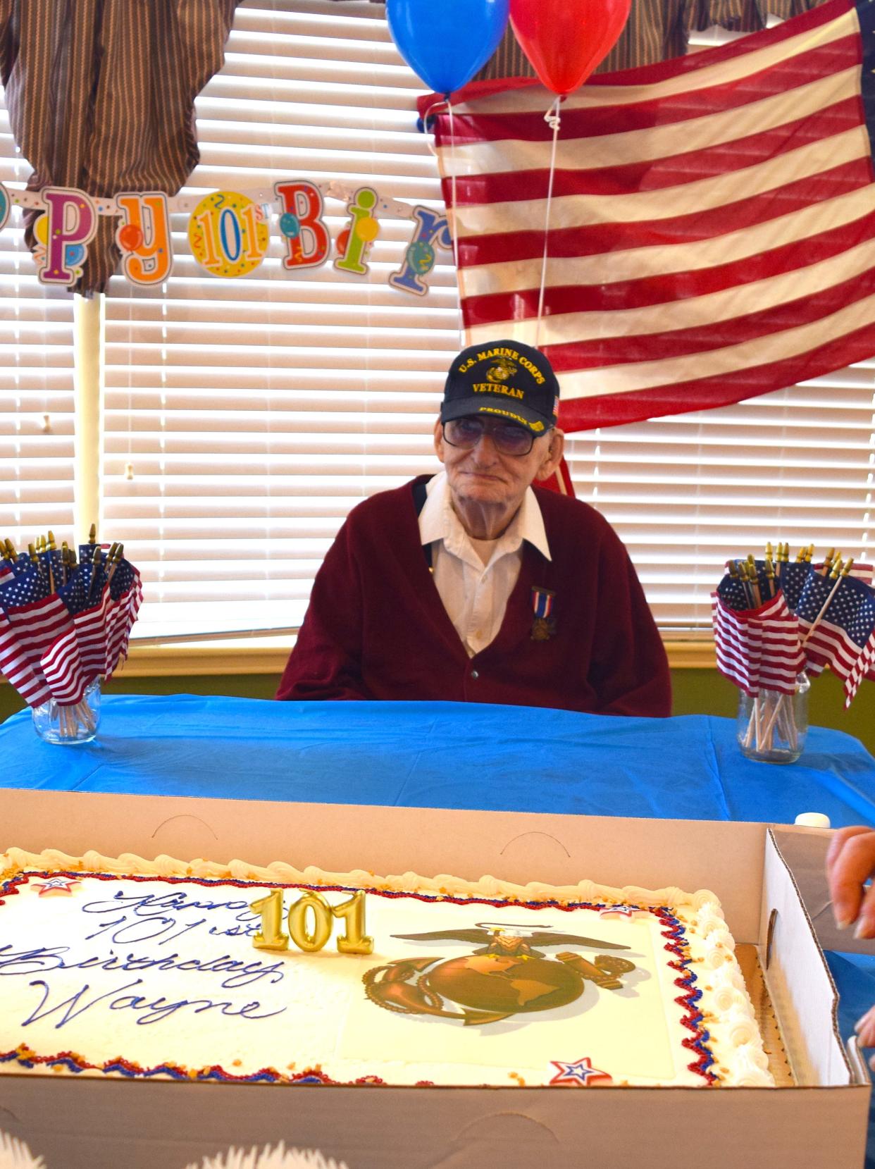 Wayne Heffelfinger looks forward to enjoying some of his birthday cake at a celebration of his 101st birthday at Sycamore Run Nursing & Rehabilitation Center near Millersburg.