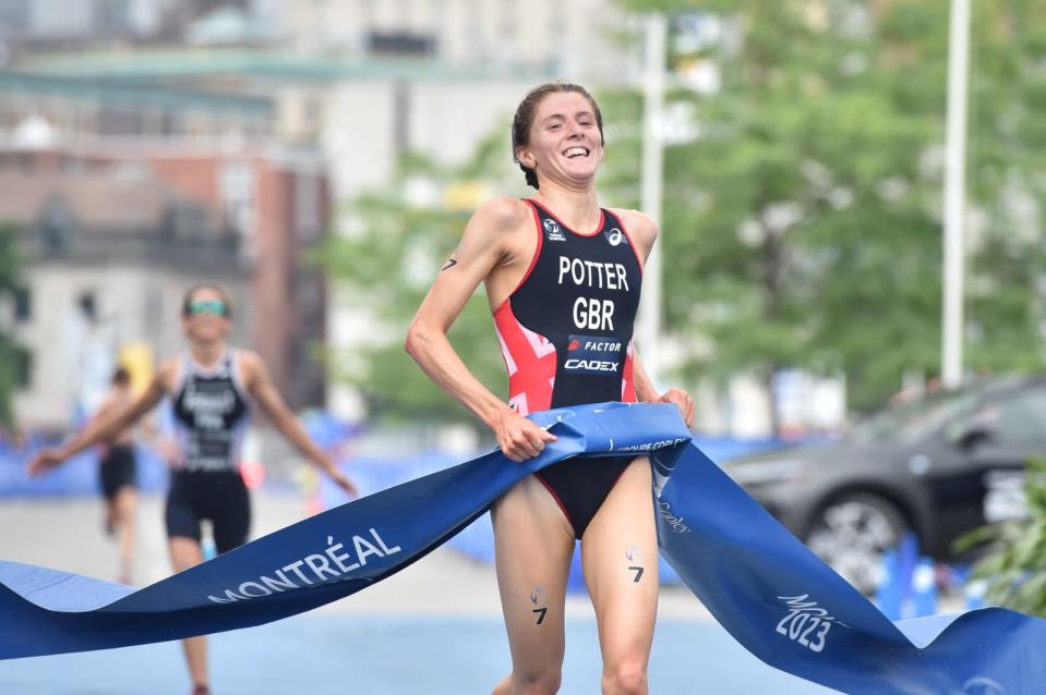 Beth Potter crosses the finish line in Montreal for her second WTCS victory of the season