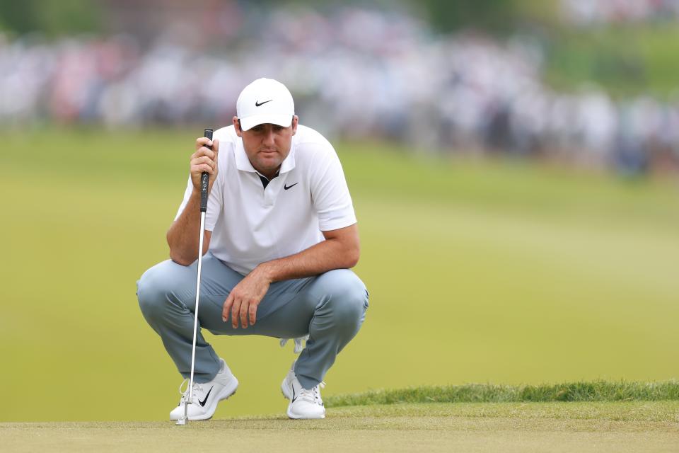 Scottie Scheffler of the United States lines up a putt on the second green during Friday's second round of the PGA Championship at Oak Hill Country Club.