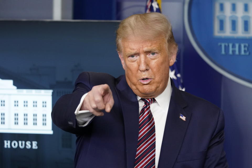 President Donald Trump calls for questions during a news conference in the James Brady Press Briefing Room at the White House, Wednesday, Aug. 12, 2020, in Washington. (AP Photo/Andrew Harnik)