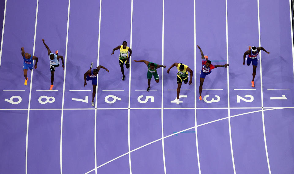 PARIS, FRANCE - AUGUST 04: Noah Lyles of Team United States crosses the finish line during the Men's 100m Final on day nine of the Olympic Games Paris 2024 at Stade de France on August 04, 2024 in Paris, France. (Photo by Richard Heathcote/Getty Images)