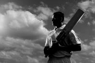 BRISBANE, AUSTRALIA - SEPTEMBER 25: (EDITORS NOTE: Images has been converted to Black and White.) Usman Khawaja of the Queensland Bulls poses during a portrait shoot at Allan Border Field on September 25, 2012 in Brisbane, Australia. (Photo by Chris Hyde/Getty Images)