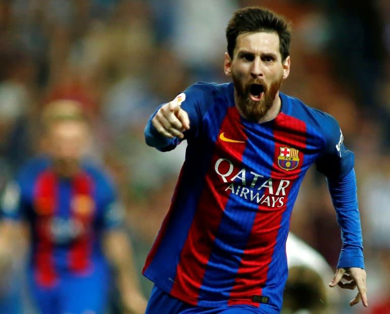 Barcelona's Argentinian forward Lionel Messi celebrates a goal during a Spanish league match against Real Madrid at the Santiago Bernabeu stadium in Madrid on April 23, 2017