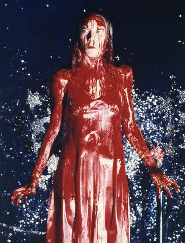 <p>Sunset Boulevard/Corbis via Getty</p> Sissy Spacek in the climax of the 1976 movie 'Carrie'