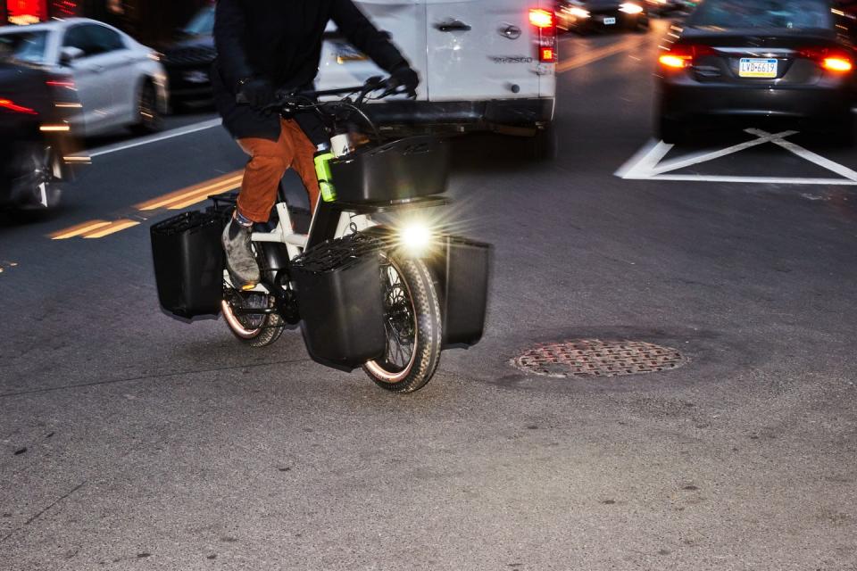 gabe ortiz on an ebike in traffic