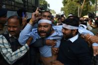 A demonstrator in Ahmedabad, Gujarat state, vents his anger at a protest against India' new citizenship law