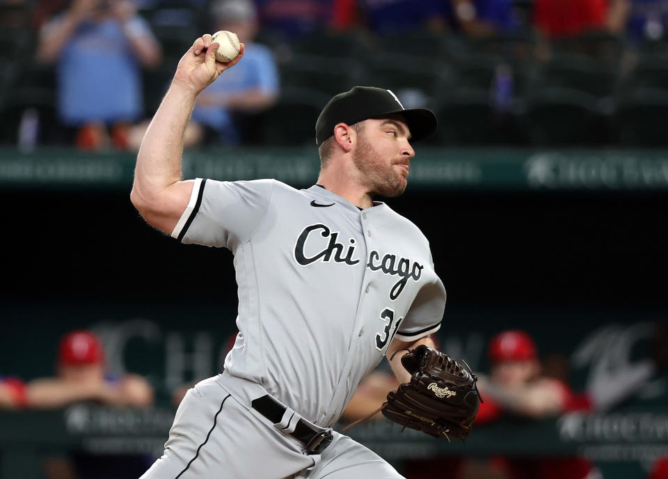 ARLINGTON, TEXAS - AUGUST 05: Liam Hendriks #31 of the Chicago White Sox pitches in the ninth inning against the Texas Rangers at Globe Life Field on August 05, 2022 in Arlington, Texas. (Photo by Richard Rodriguez/Getty Images)