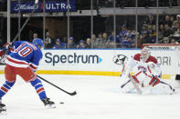 Montreal Canadiens goaltender Cayden Primeau, right, tends net against New York Rangers left wing Artemi Panarin (10) during the first period of an NHL hockey game, Sunday, April 7, 2024, at Madison Square Garden in New York. (AP Photo/Mary Altaffer)