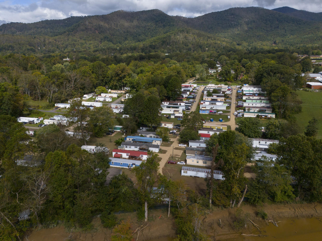 A trailer park that was inundated with water during a flash flood is seen in the aftermath of Hurricane Helene, Tuesday, Oct. 1, 2024, in Swannanoa, N.C. (AP Photo/Mike Stewart)