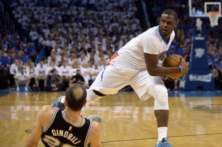 May 6, 2016; Oklahoma City, OK, USA; Oklahoma City Thunder guard Dion Waiters (3) commits an offensive foul agains tSan Antonio Spurs guard Manu Ginobili (20) during the first quarter in game three of the second round of the NBA Playoffs at Chesapeake Energy Arena. Mandatory Credit: Mark D. Smith-USA TODAY Sports