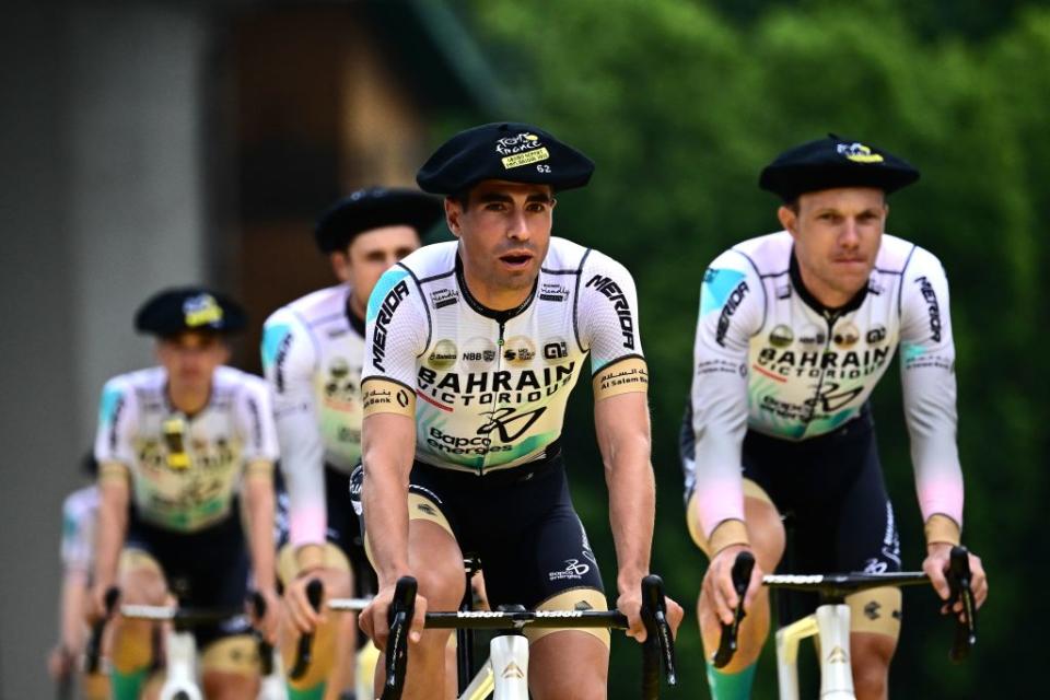 Bahrain  Victorious Spanish rider Mikel Landa C and teammates cycle to the podium during the official teams presentation near the Guggenheim Museum Bilbao in Bilbao northern Spain on June 29 2023 two days prior to the start of the 110th edition of the Tour de France cycling race Photo by Marco BERTORELLO  AFP Photo by MARCO BERTORELLOAFP via Getty Images