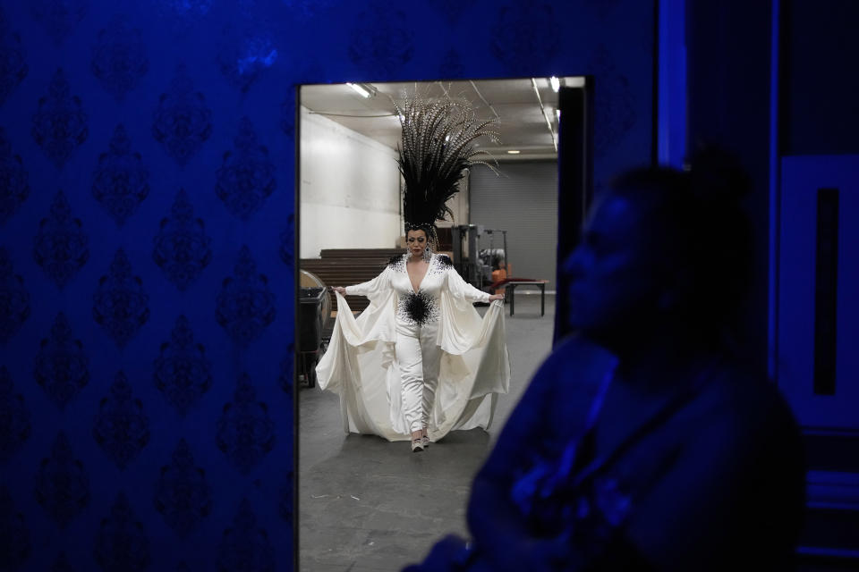 Selena D'Angelo prepares backstage before performing in the Mahu Magic drag show at the Western Regional Native Hawaiian Convention, Tuesday, June 20, 2023, in Las Vegas. (AP Photo/John Locher)