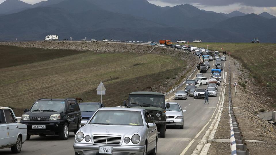 FILE - A convoy of cars of ethnic Armenians from Nagorno-Karabakh move to Kornidzor in Syunik region, Armenia, on Sept. 26, 2023. Israel has quietly helped fuel Azerbaijan’s campaign to recapture Nagorno-Karabakh, officials and experts say, supplying powerful weapons to Azerbaijan ahead of its lightening offensive last month that brought the Armenian enclave in its territory back under its control. (AP Photo/Vasily Krestyaninov, File)