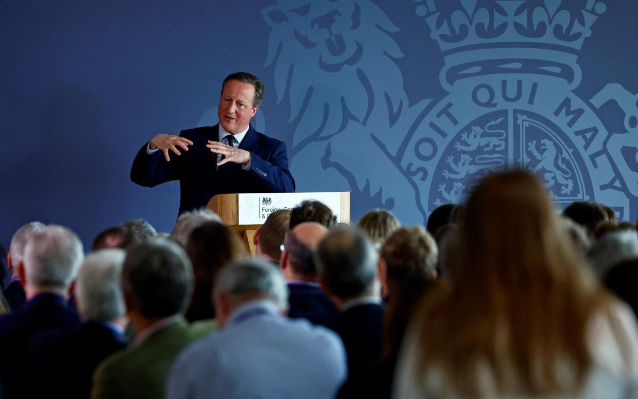 Lord Cameron delivering a speech