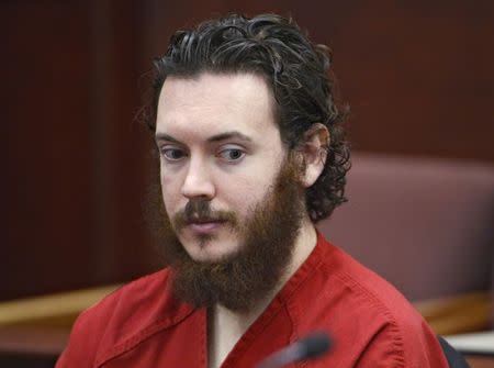 James Holmes sits in court during a hearing at the Arapahoe County Justice Center in Centennial, Colorado in this file photo taken June 4, 2013. REUTERS/Andy Cross/Pool